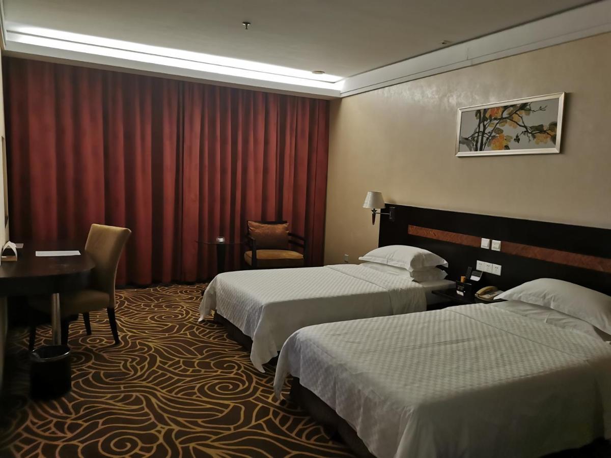 Hua Shi Hotel Kanton Exterior foto