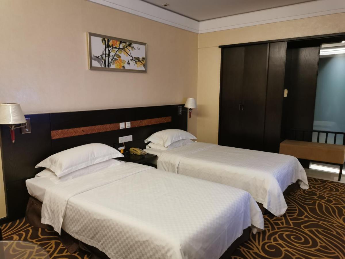 Hua Shi Hotel Kanton Exterior foto