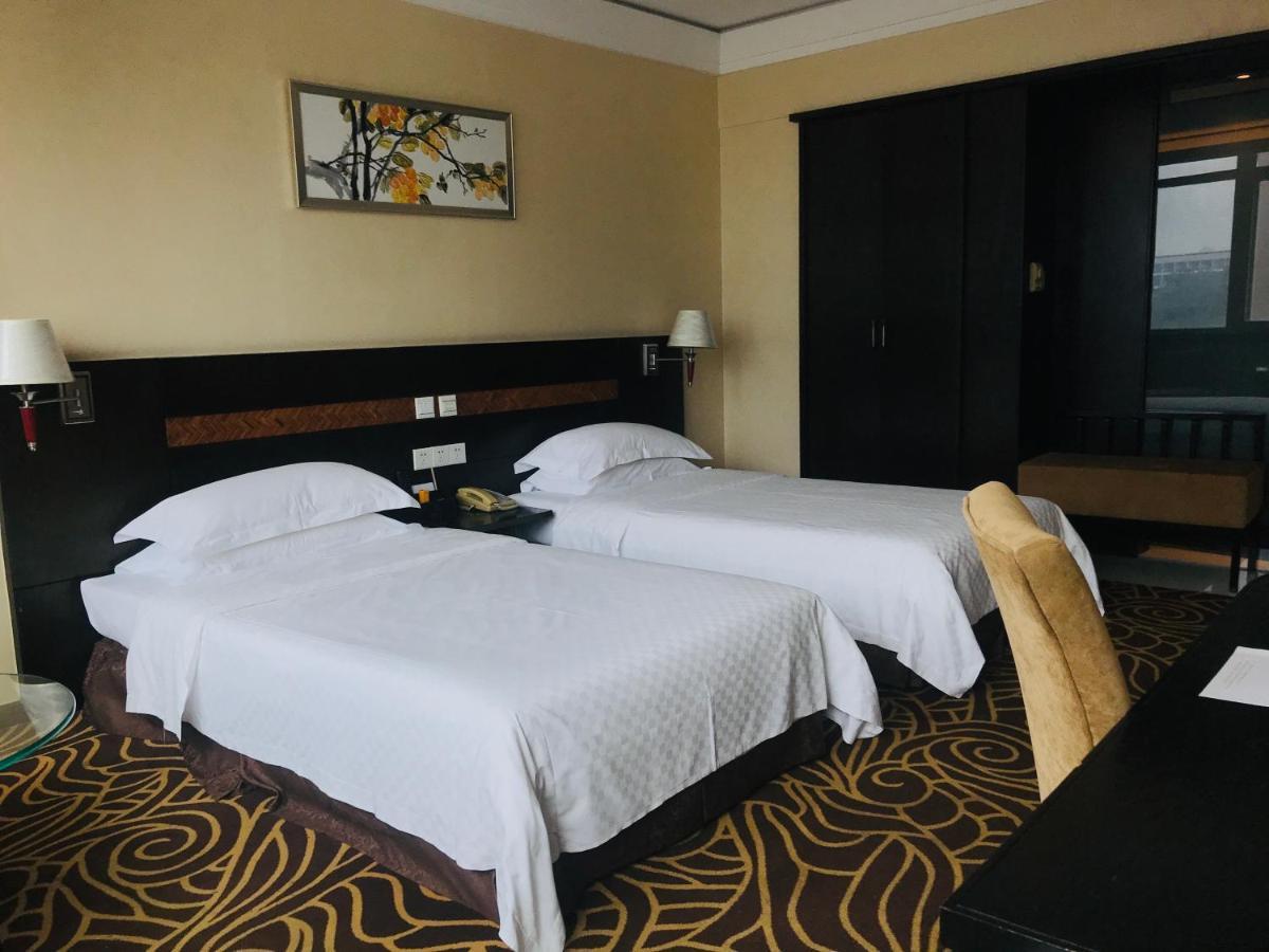Hua Shi Hotel Kanton Exterior foto